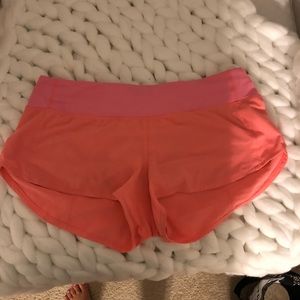 Bright orange lululemon shorts